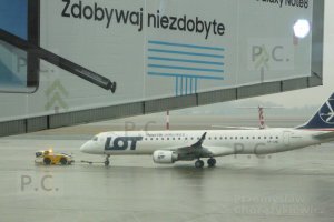 yellow airport tug (pusher)