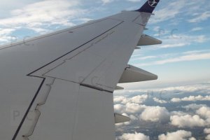 embraer wing clouds