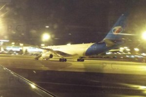 Travel Service Airbus A330 at night Chopin Airport 18. 01. 2019.JPG