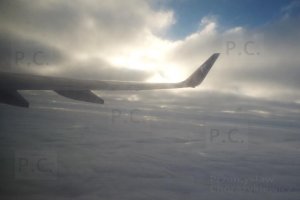 photo into the sun b 737 wing ble air logo.JPG