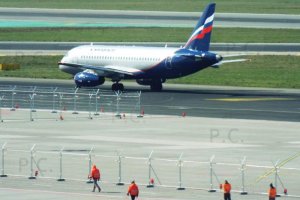 aeroflot superjet and four people.jpg