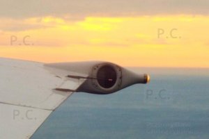 not an alien craft but boeing b 737 wingtip lighting at dawn.JPG