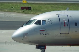 ra-89065 osipov superjet chopin airport.JPG