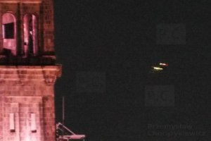 jet aircraft night chopin palace of culture and science.JPG