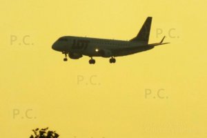 polish airlines embraer sunset chopin airport.JPG