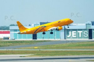 flight operations chopin airport 30 july 2019 sp-lno yellow embraer take off.JPG