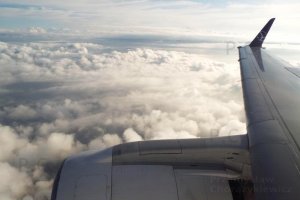 poland jet passenger aircraft high above clouds.JPG