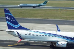 new gen boeing b 737 sp-lwe and carpatair chopin 2019.JPG