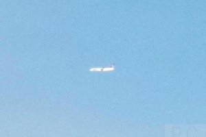 lot polish airlines b 737 seen from e 170.JPG