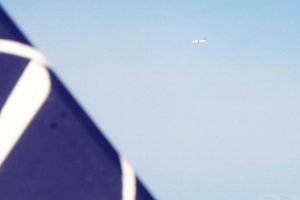 boeing b 737 air to air photo embraer 170.JPG