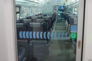 przemysl kiyv hyundai rotem train carriage glass door.JPG