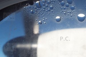 tiny drops on aircraft window