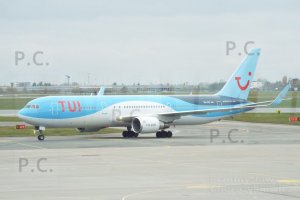 logo tui samolot warszawa malowanie w fale